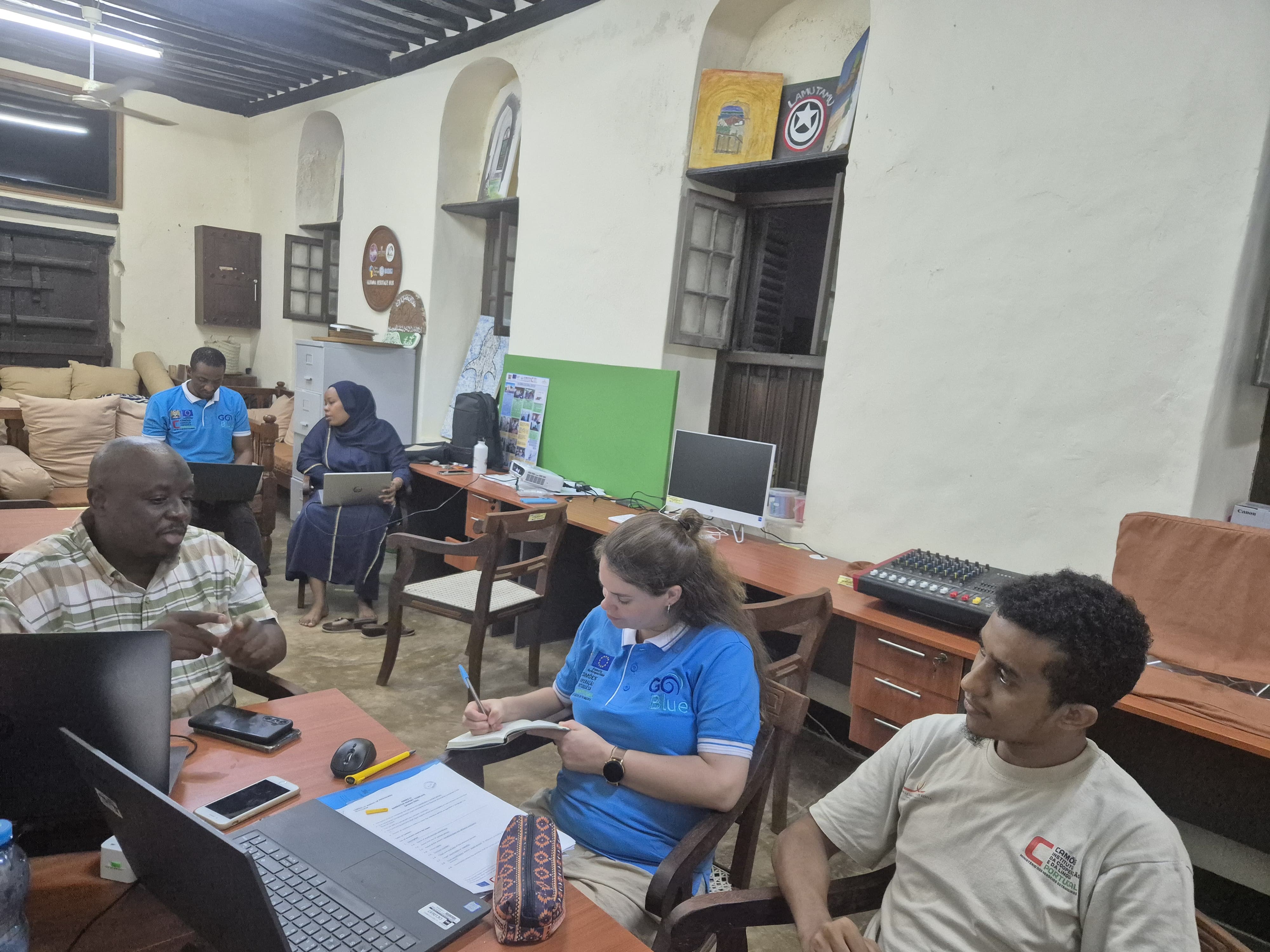 The camoes team working closely with one of the beneficiaries from Lamu